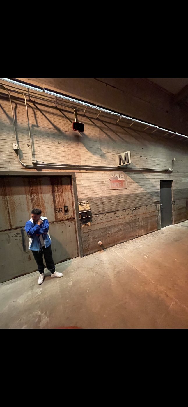 Belinskii in an industrial loading dock warehouse